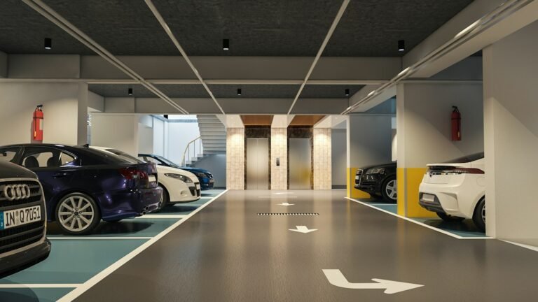 Parking souterrain sous des logements : plafond isolé par flocage thermique